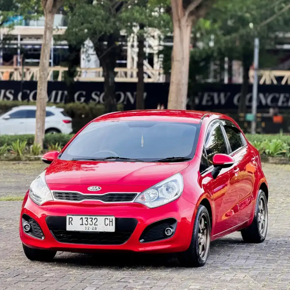 KIA RIO 1.4 SE MT 2013 MERAH METALIK