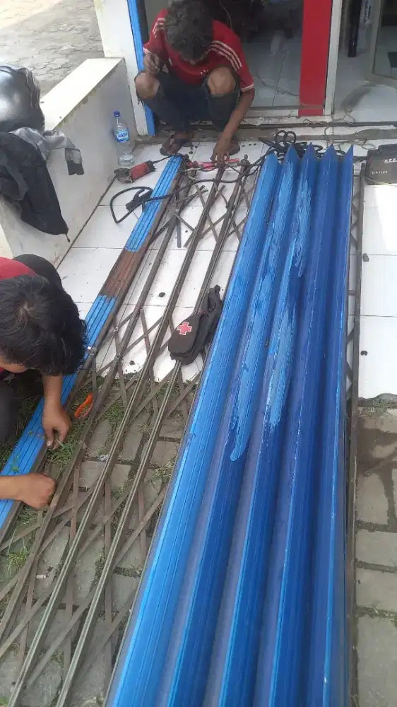 Tukang service pintu rolling door folding gate