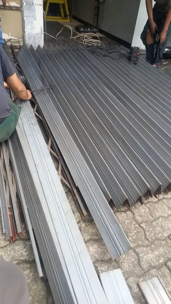 Tukang reparasi rolling door folding gate murah