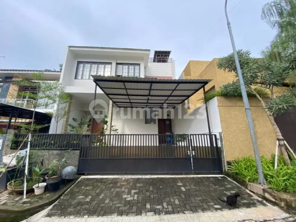 Rumah Minimalis Modern Style dengan Rooftop di Villa Cinere Mas