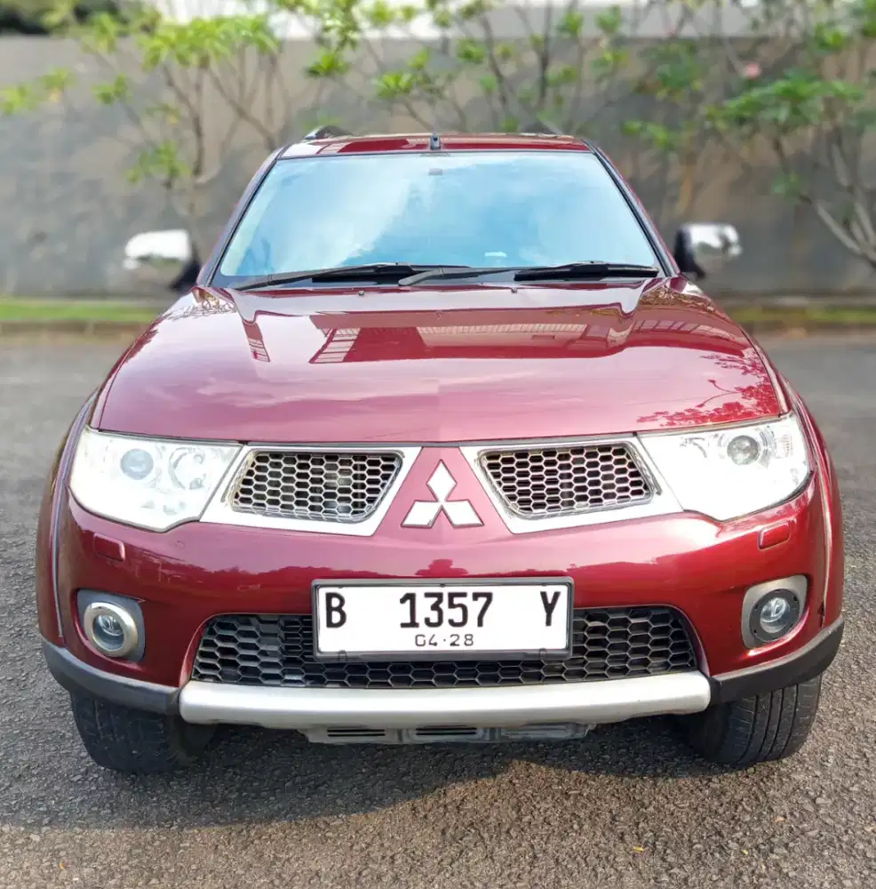 Mitsubisihi Pajero Sport Dakar 2.5 4x2 Diesel AT 2012 Merah Istimewa