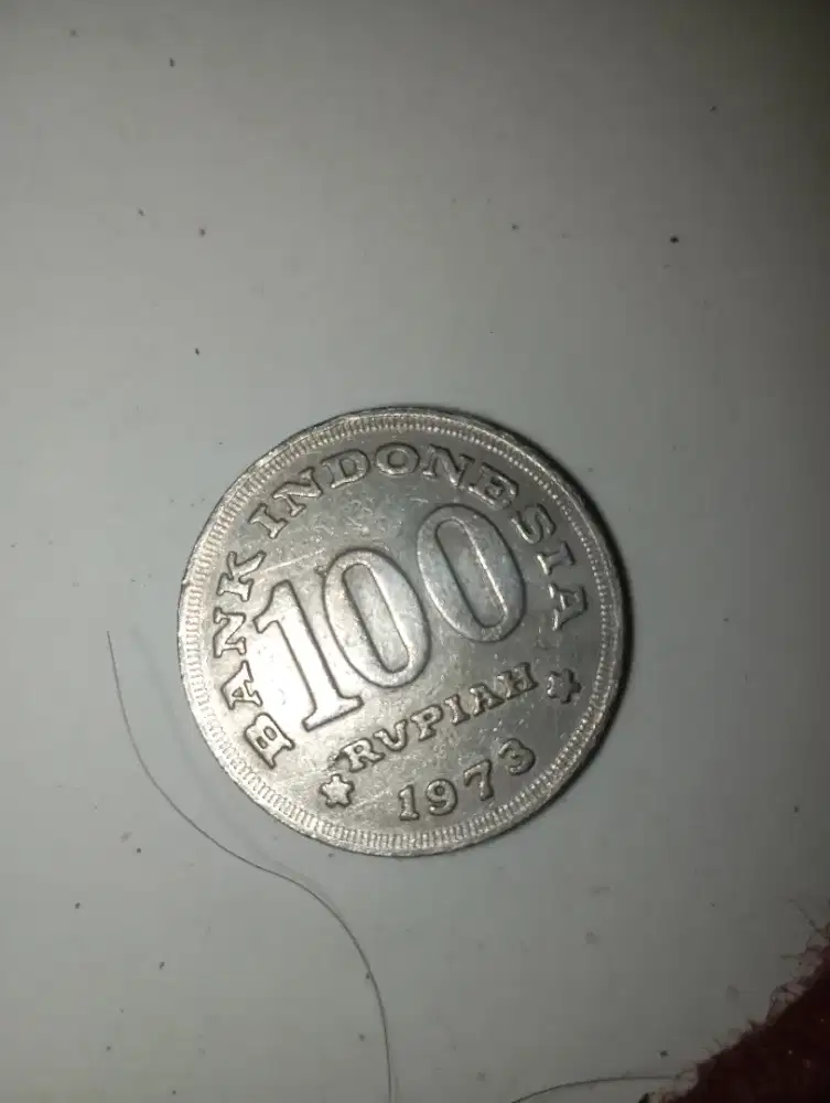 Uang logam 100 tahun 1973