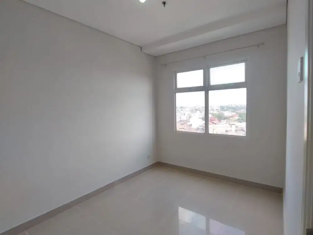 1BR Unfurnished Apartemen Madison Park - Mall Central Park