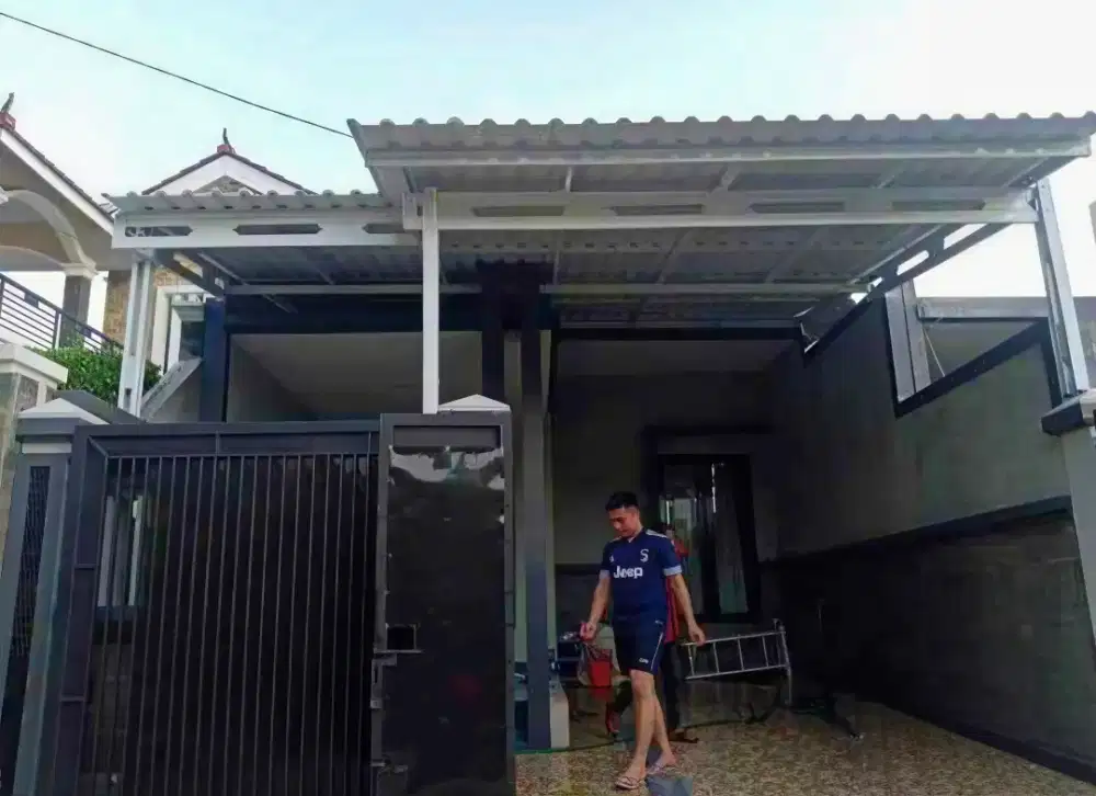 Kanopi baja ringan dan garasi