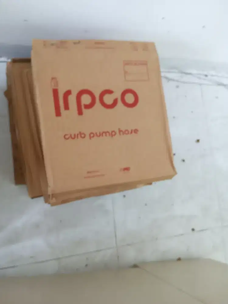 Irpco brand curb pump hoses, typically used for dispensing gasoline.