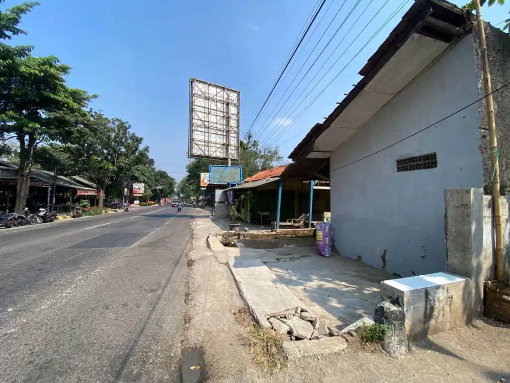 Dijual Tanah dan Bangunan Rumah Strategis Pinggir Jalan Raya Nasional