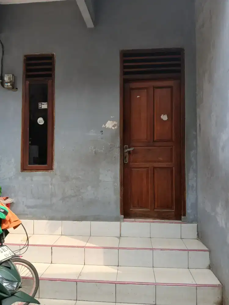 Di Kontrakkan Rumah