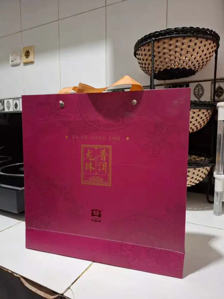 Pu er long zhu taetea teh china asli
