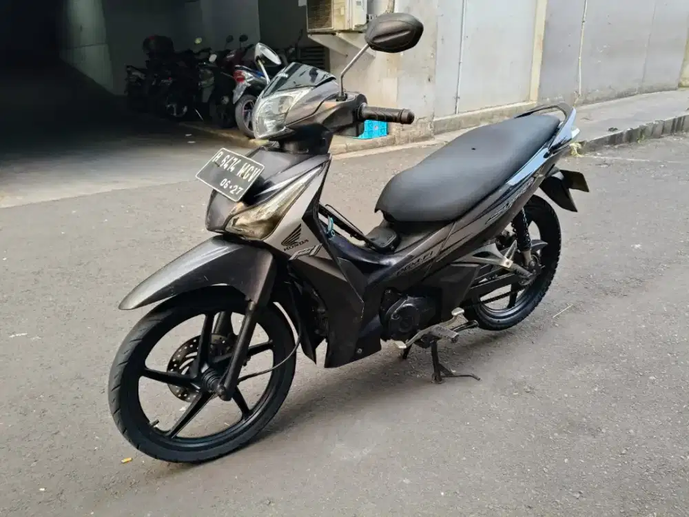 Honda Supra X 125 Helm In PGM-FI Thn 2012
