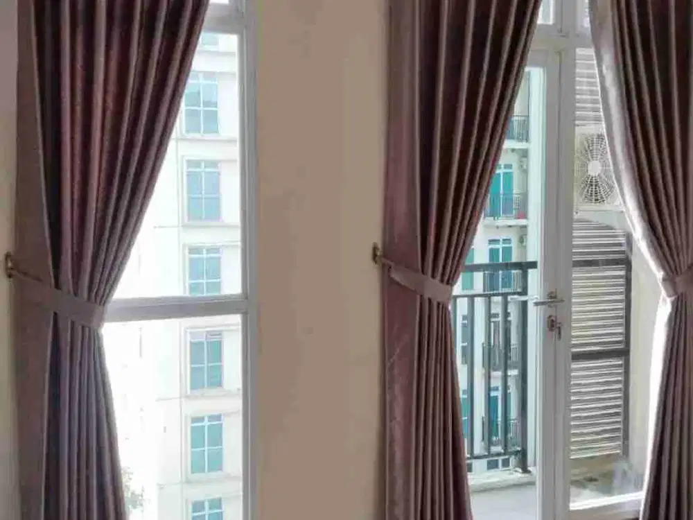 disewakan studio unfurnished lt. rendah Apt. Puri Orchard.