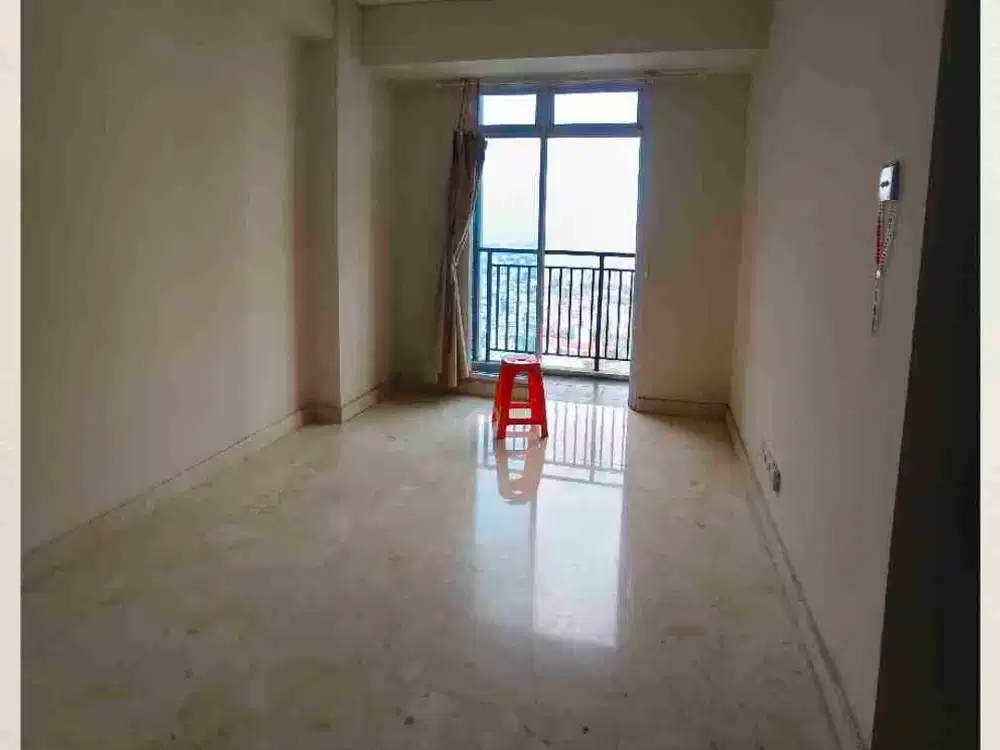 disewakan 2BR unfurnished lt. tinggi Apt. Puri Orchard.