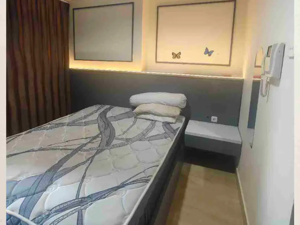 disewakan studio furnished lt. rendah Apt. Puri Orchard.
