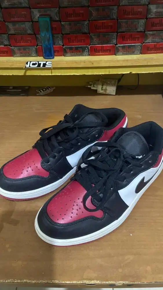 Nike AJ low bred toe