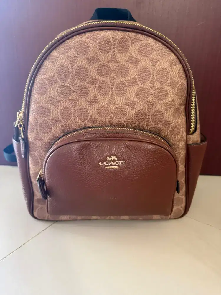 Tas coach backback signature