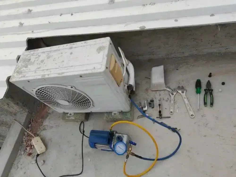 SERVICE AC BONGKAR PASANG AC