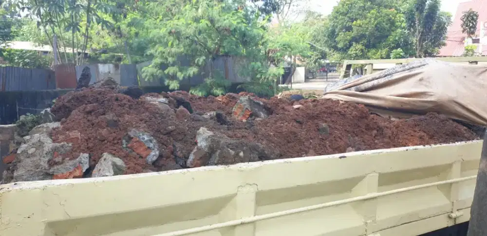 Buang puing dan angkutan sampah