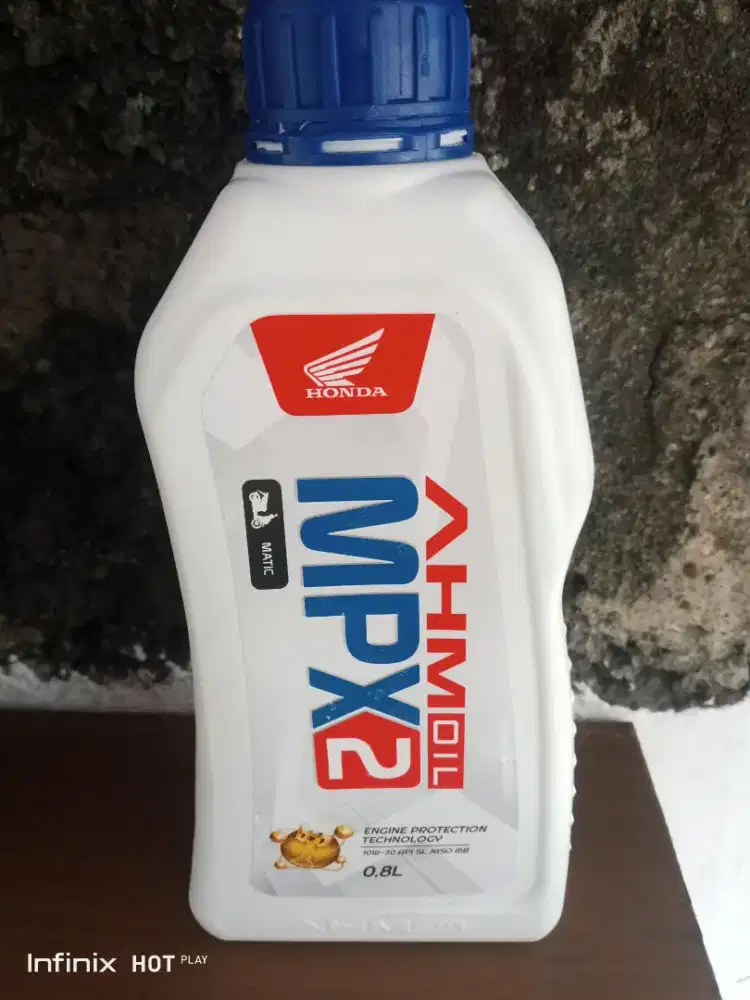 Oli motor metik
