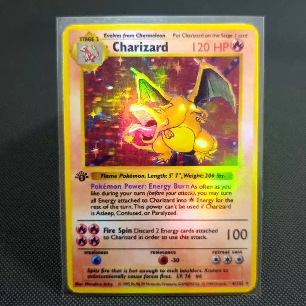 Kartu pokemon charizard 1st edition holo replika