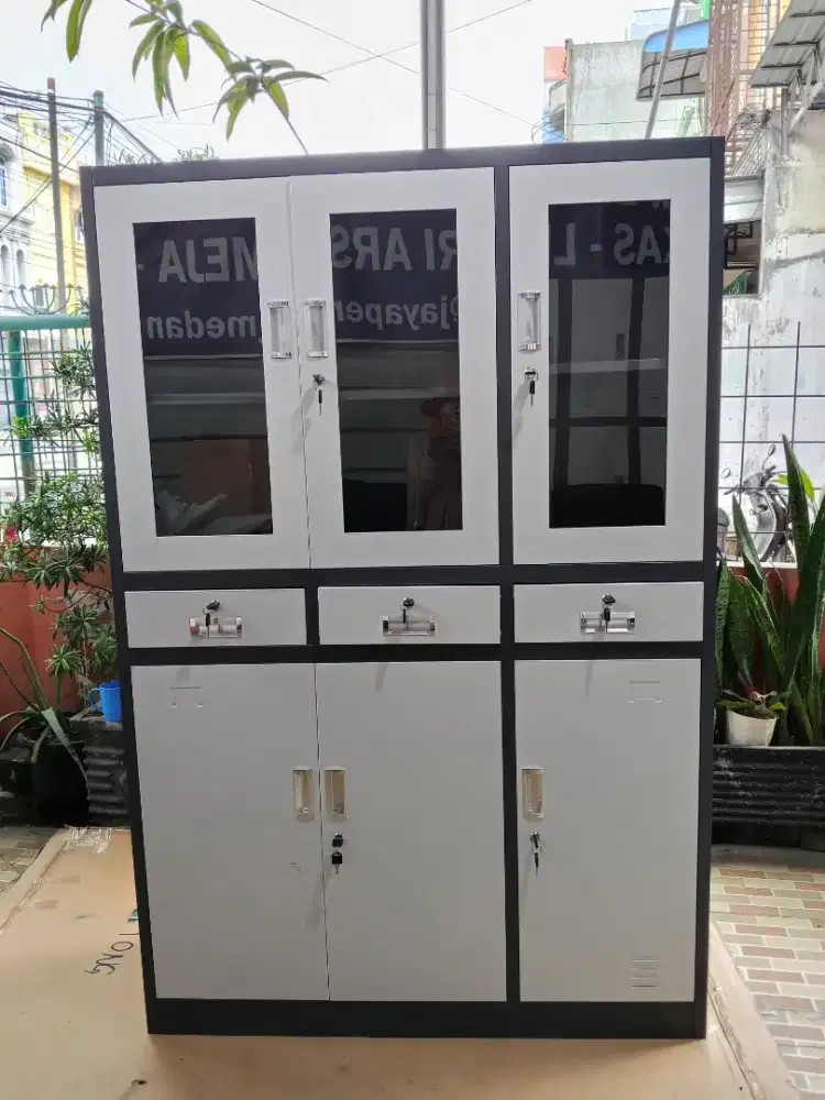 Lemari arsip 3 pintu + laci