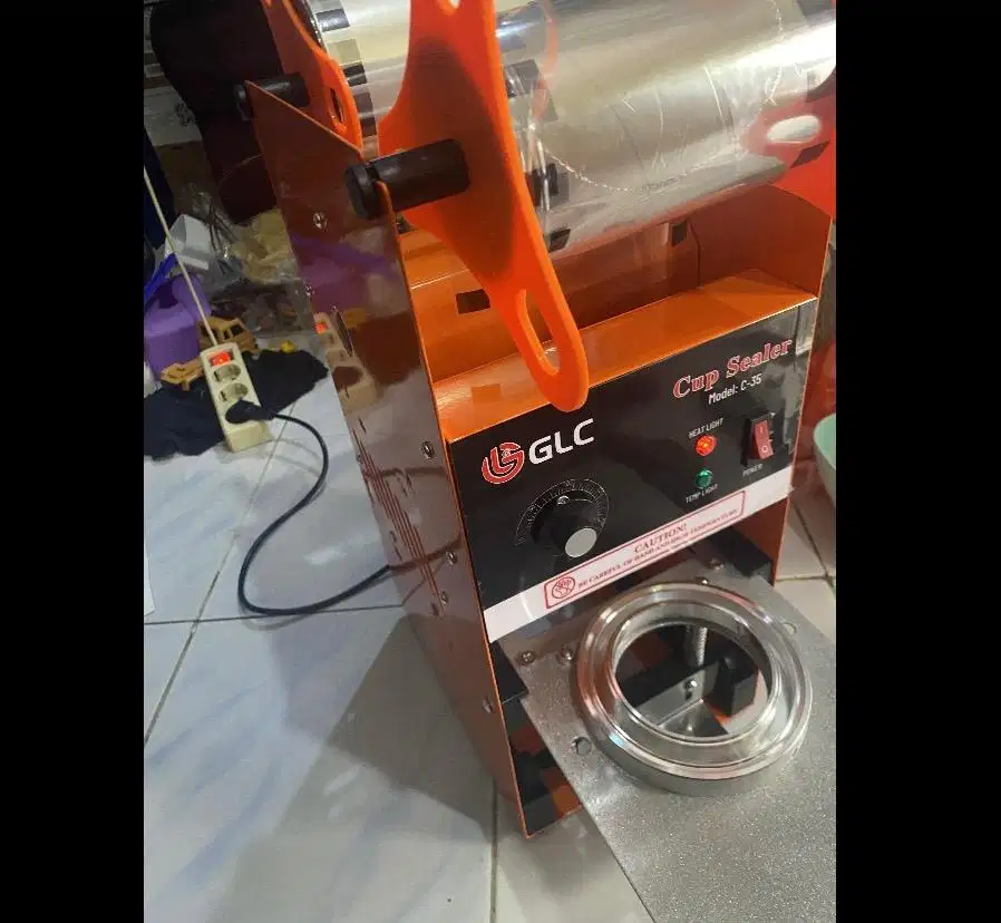 Mesin cup sealer