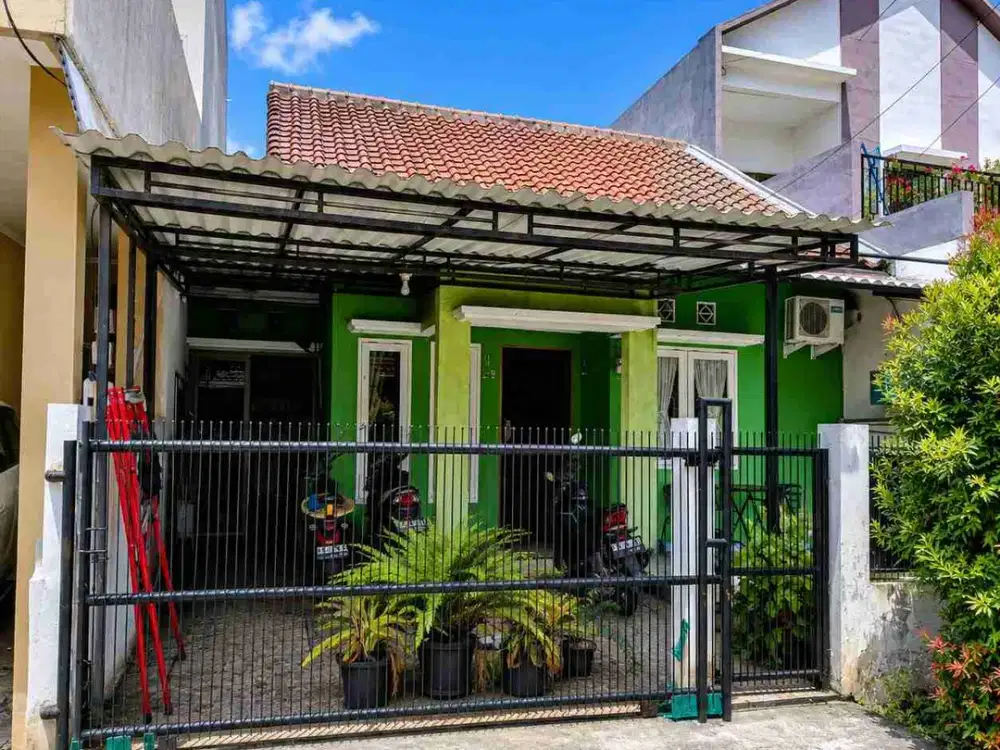 Di jual rumah dalam perumahan cluster besar nyaman aman tenang tempat strategis Lokasi peninggilan Ciledug Tangerang kota