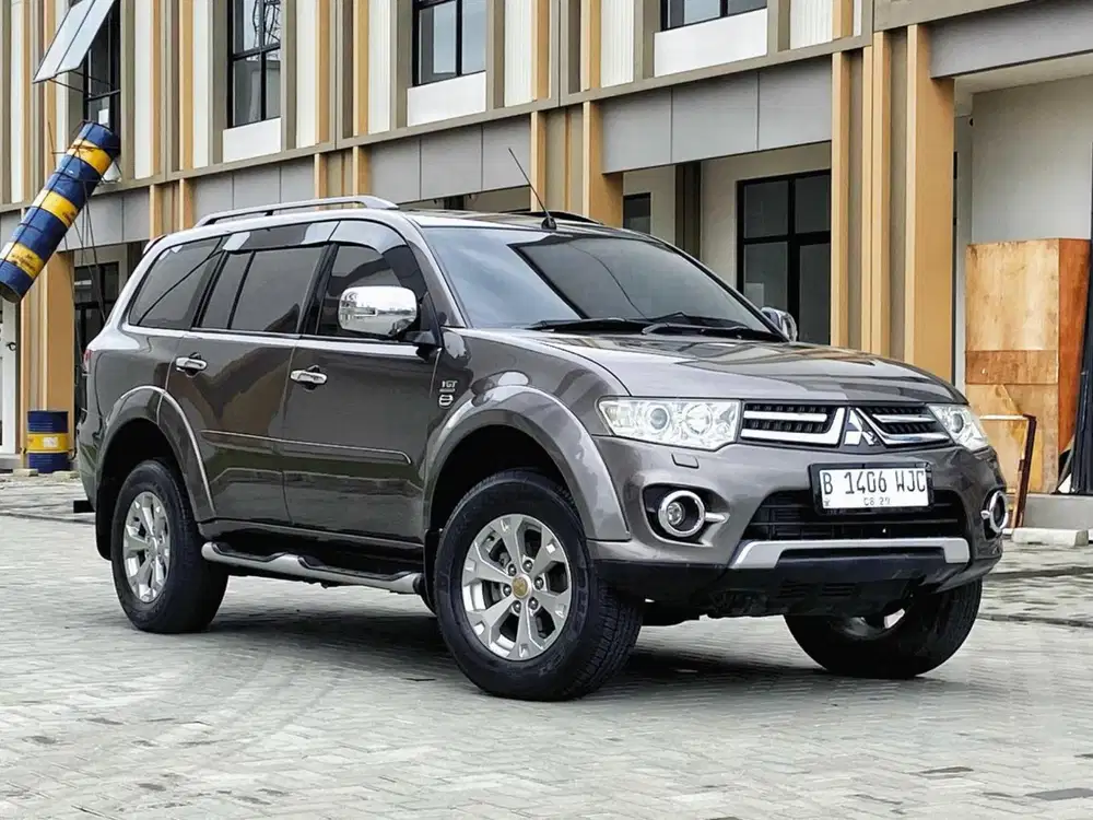 MITSUBISHI PAJERO SPORT 2.5 DAKAR VGT 2014 COKLAT AN PERORANGAN 2015