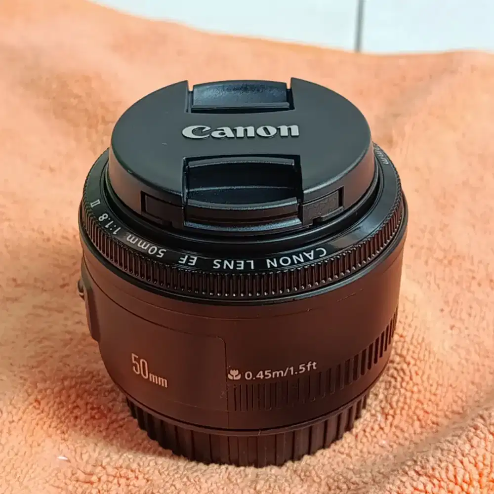 BEKAS PAKAI LENSA FIX CANON 50MM F1.8 kondisi mulus