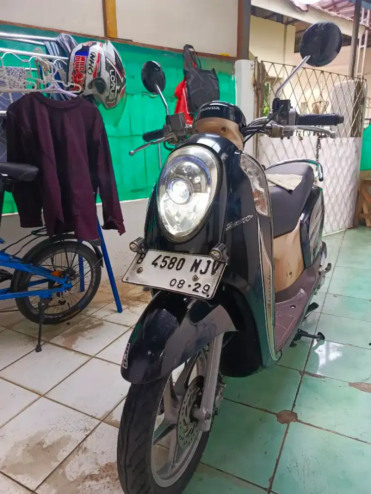 SCOOPY ISTIMEWA RAWATAN