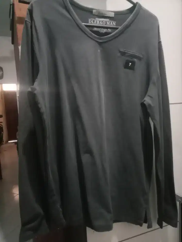 Kaos pria merk Duolebao