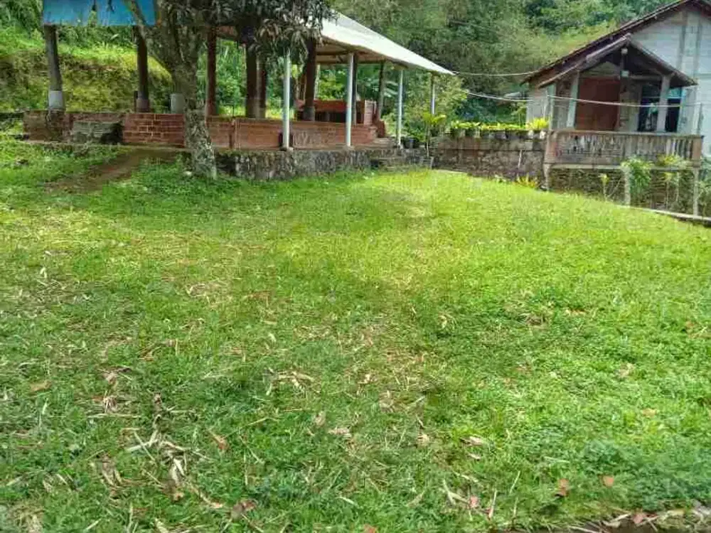 Tanah Kebun ada mata air sudah pagar keliling di Caringin Bogor