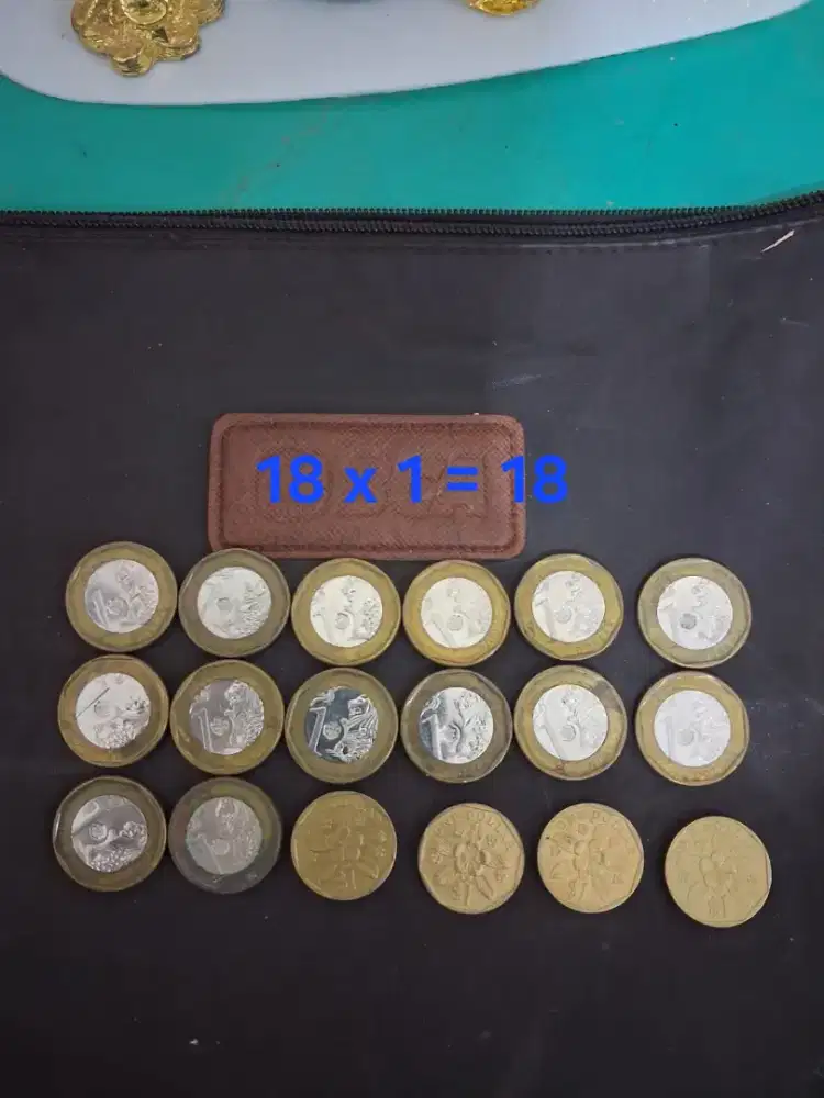 1 dollar koin singapura
Ada 12 koin 18 x 1=18
Limited edition
Barang t