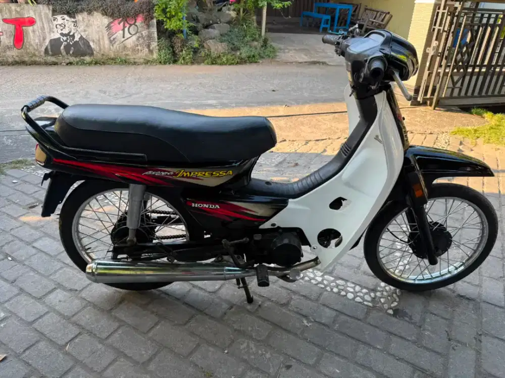 Astrea grand impressa THN 1998 plat AB Bantul