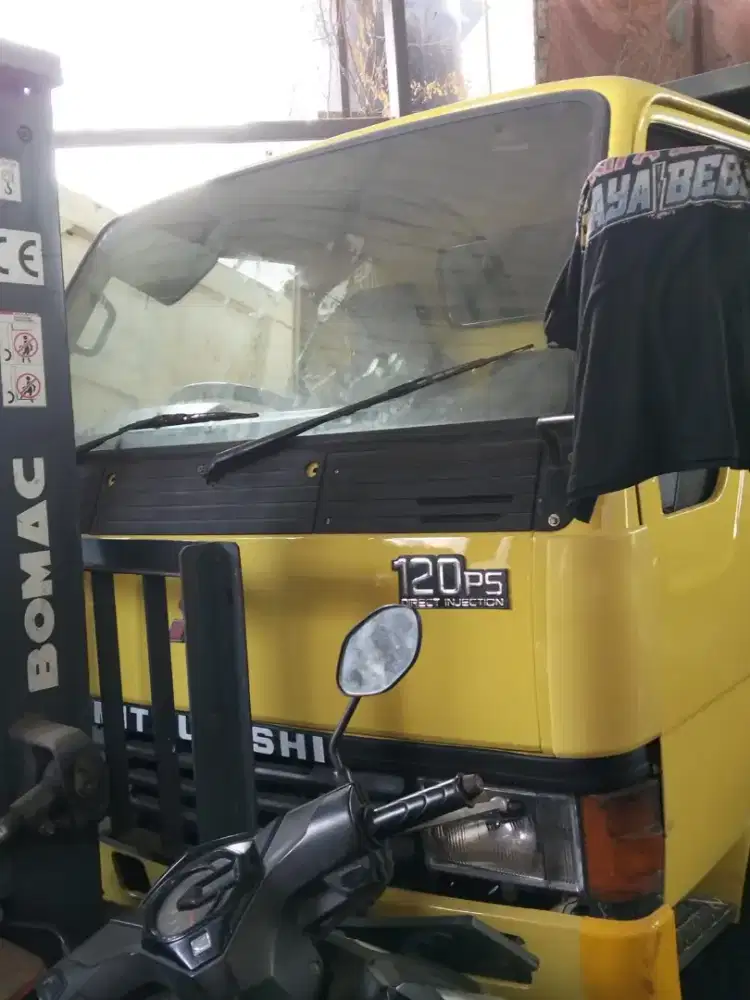 Mitsubishi colt diesel ps 120 dobel 6 ban 2003 dumptruk