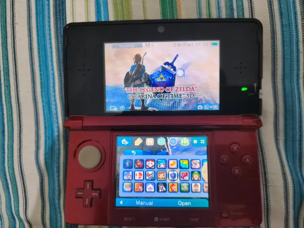 Nintendo 3ds merah