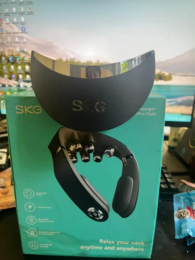 Alat pijat leher SKG Neck Massager