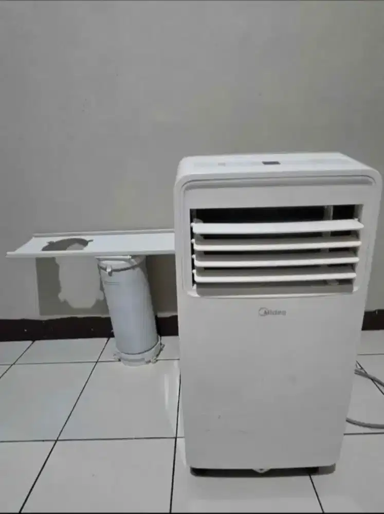 ac portable midea 1/2 pk