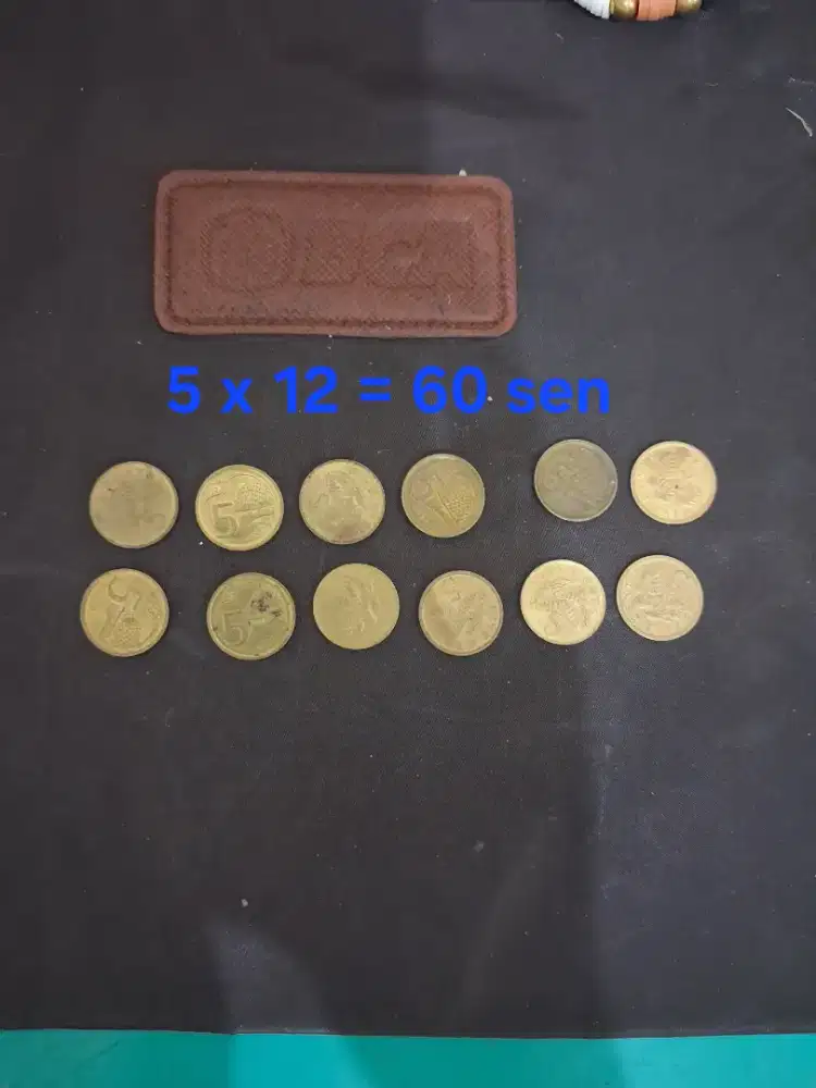 5 cents koin s g d
Ada 5 x 12 = 60 sen
Limited edition
Barang teraw