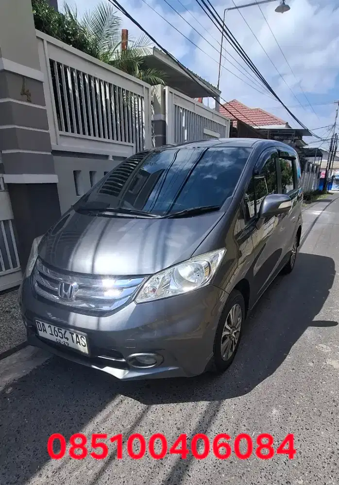 Dijual honda freed 1,5 E AT PSD tahun 2014. Mulus. atas nama sendiri