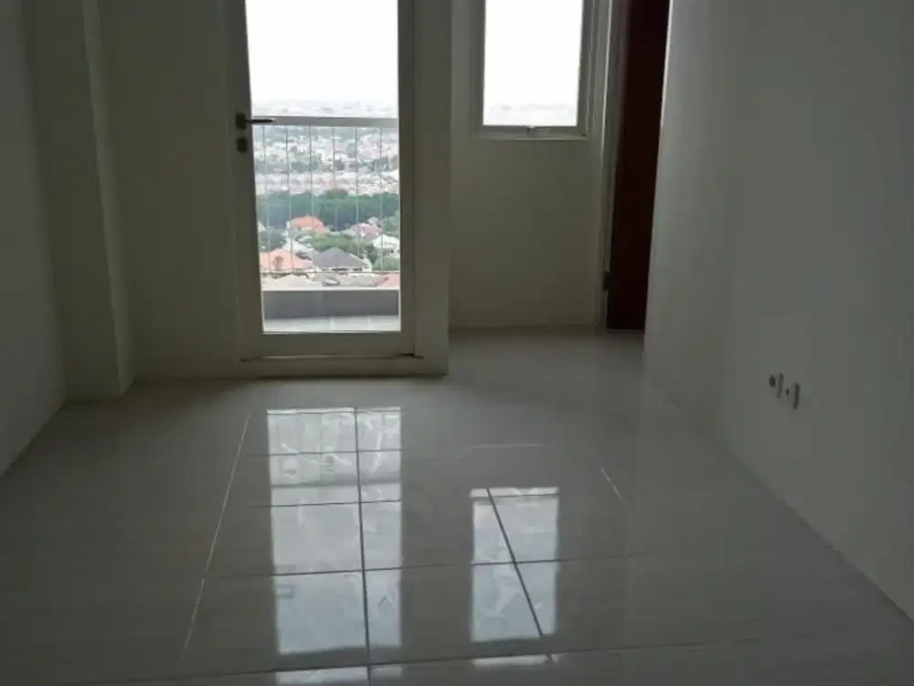 Jual cepat, Apartemen Puncak Dharmahusada 2 bedroom unfurnished Tower B Lantai 21