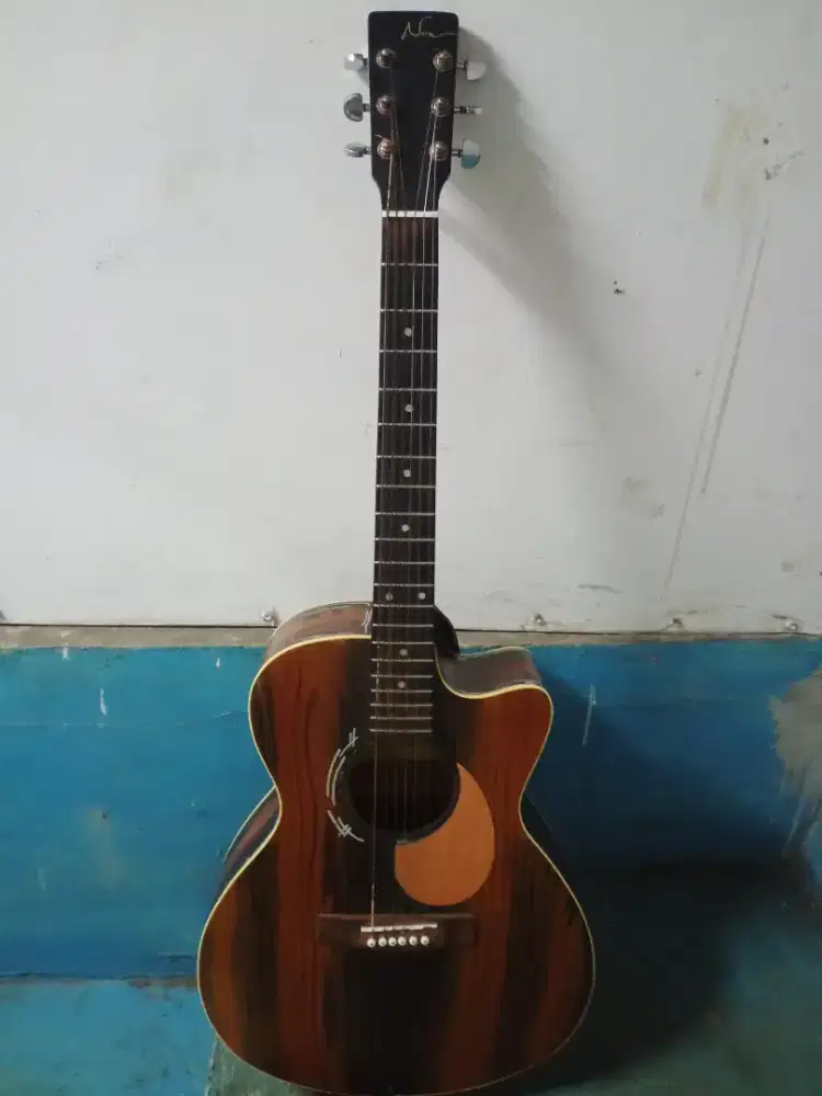 gitar akustik nira