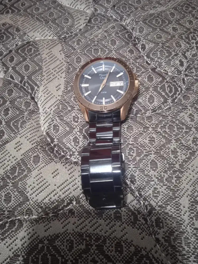 Jam AC 6213 MC.