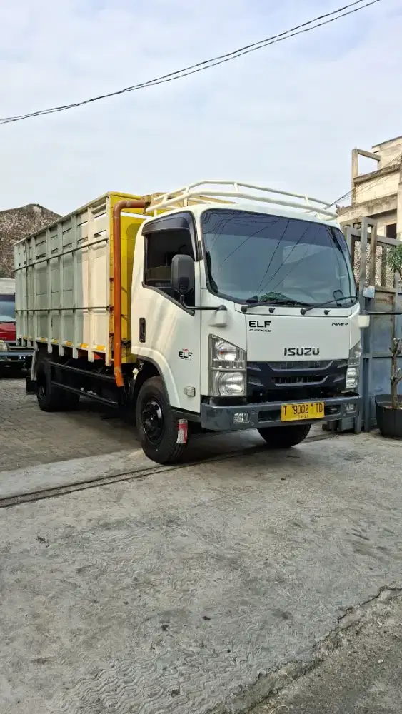 ISUZU NMR 81 HD CDD 6roda bak central orsinil 2022