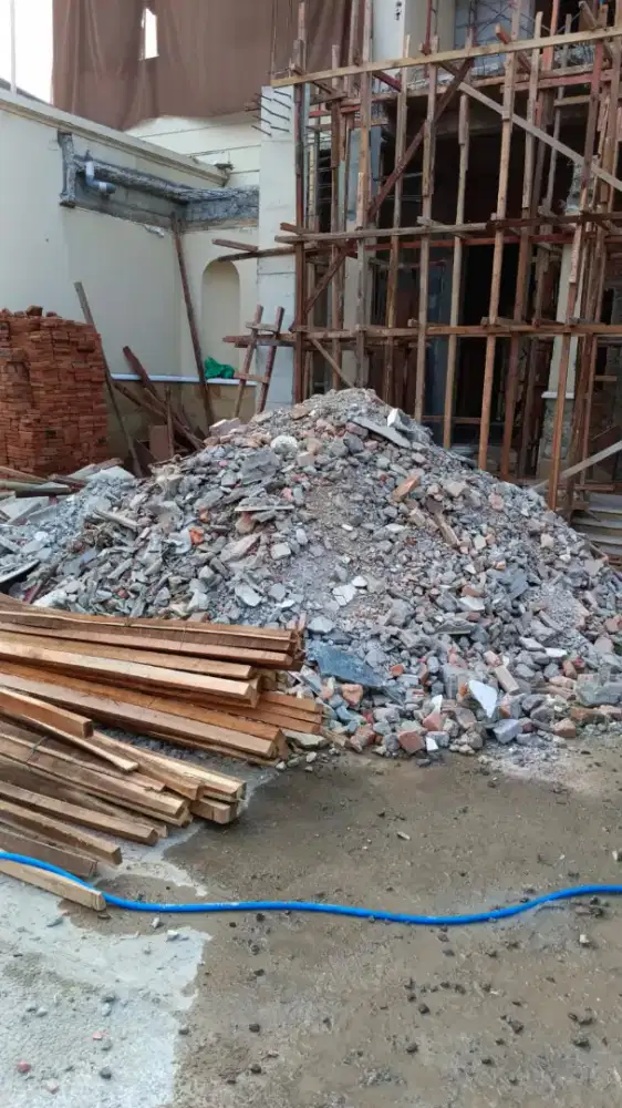 Jasa buang puing dan pengurugan