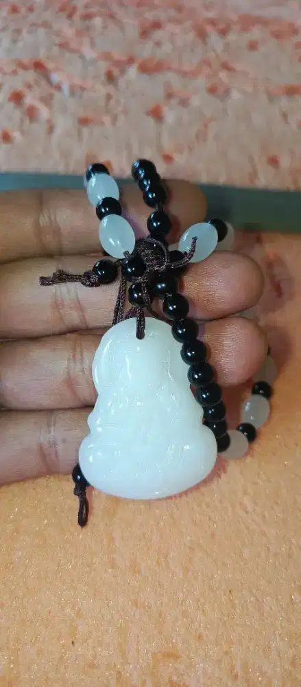 Kalung motif dewa bahannya dingin jadul kuno dan antik