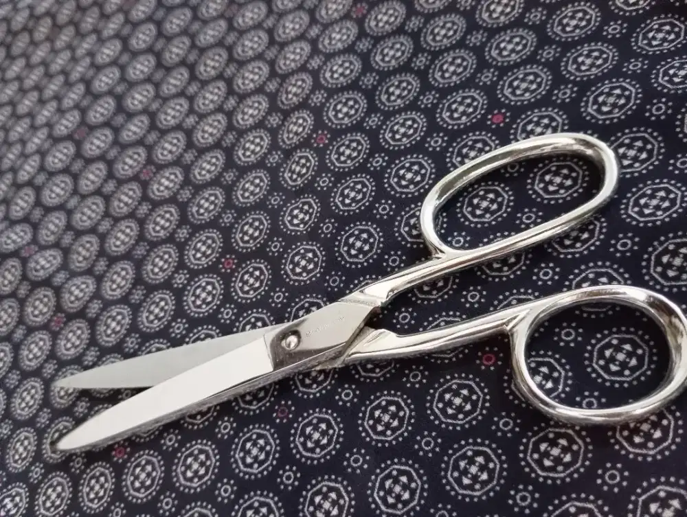 Gunting stainless merek singer
