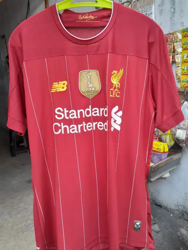 Pakean Liverpool LFC Fifa World Champions 2019 New Balance Original