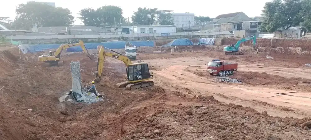 Bongkar bangunan beton hotmix aspal turap