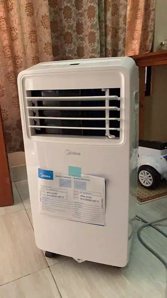 Ac Portable Midea 1/2 PK
