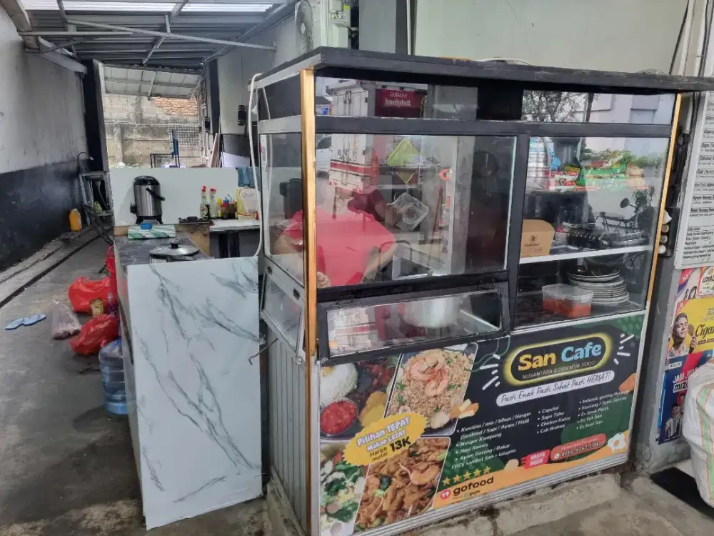 Penjaga kios makanan