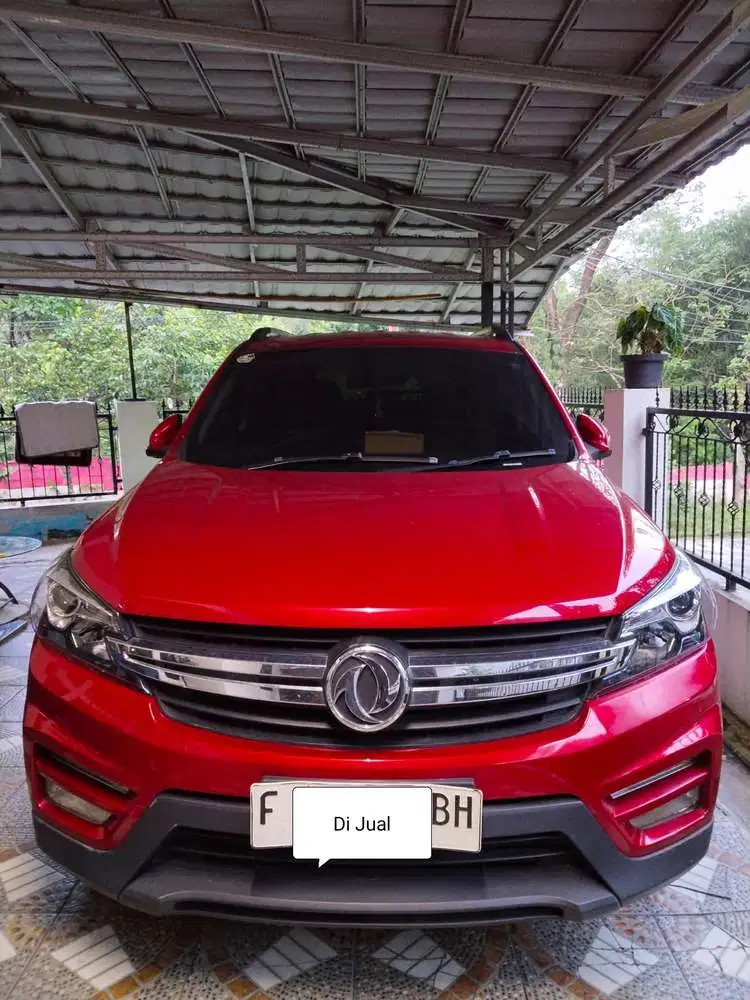 Kilometer 10 ribu. DFSK Glory 560 Matik 1.5 L Turbo AT 2023